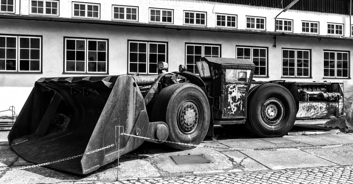 Black and white photo of historical mining machinery at Rammelsberg Museum in Goslar, Germany.